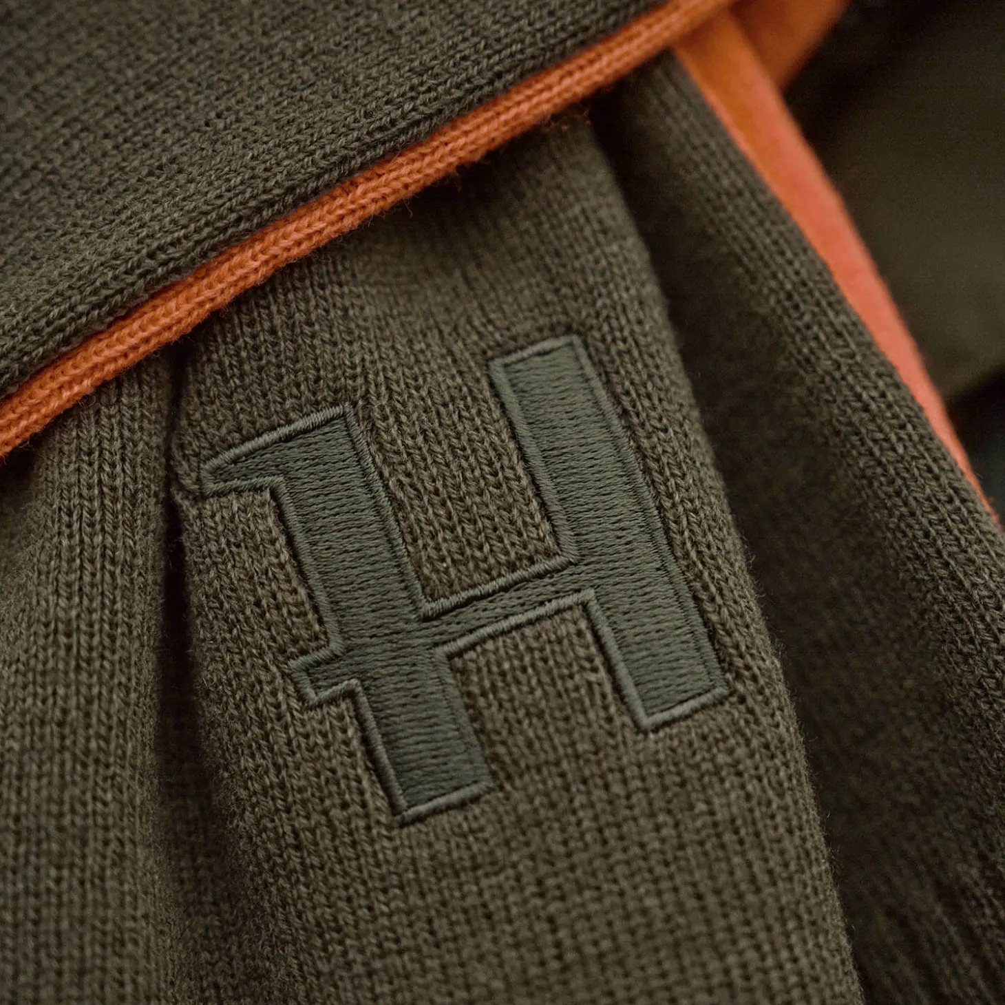 Härkila Wendeschal Reversible (Willow Green/Orange)